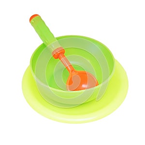 Plastic tableware toys on white background