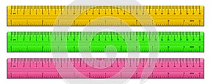 Plastic tape rulers set isolated on white. Double sided measurement in cm and inches