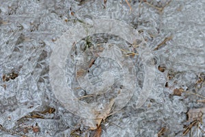 plastic texture from a piece of crumpled dirty white gray cellophane from a package