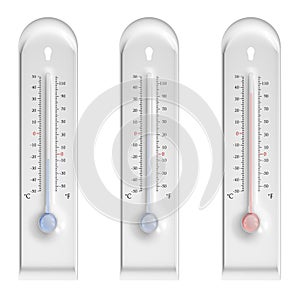 Plastic thermometers on white background