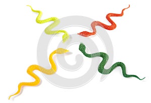Plastic tiy snakes chatting - gossip concept