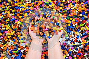 Plastic toy blocks on white background