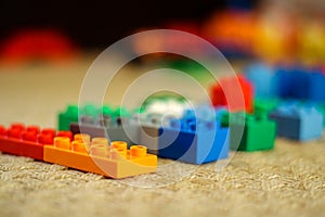 Plastic toy building blocks with defocused background