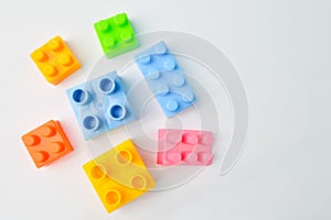 Plastic toy building blocks isolated on a white background