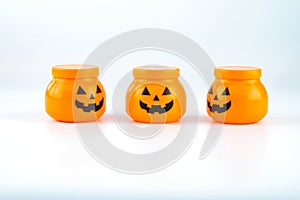 Plastic toy pumpkin for halloween decoration isolated on white background