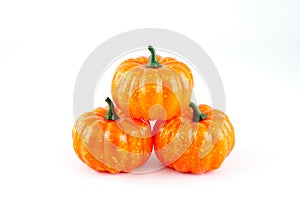 Plastic toy pumpkin for halloween decoration isolated on white background