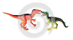 Plastic toys dinosaurs fight scene