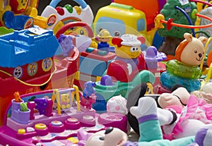 Plastic toys for kids displayed at flea market