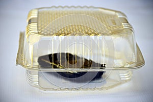 Plastic transparent box with mobile phone inside