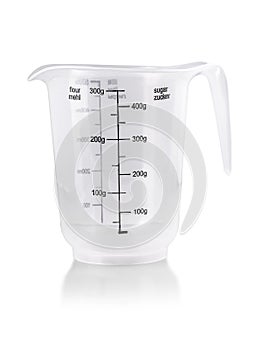 Plastic Transparent kitchen measuring cup isolated on white