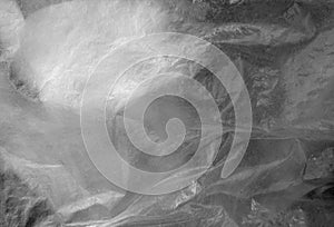 Plastic transparent old wrap texture in black and white.