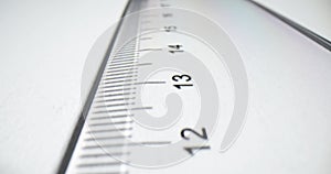 Plastic transparent ruler on white paper