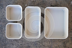 Plastic trays of different size for sundries photo