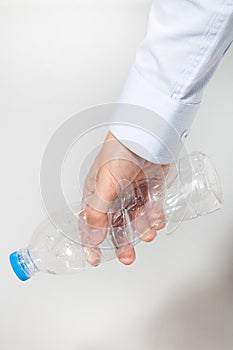 Plastic twist bottle in business man hand