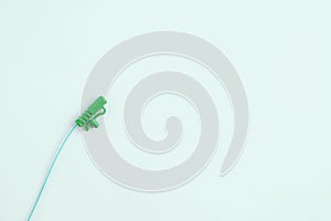 Plastic urological catheter close-up on white background