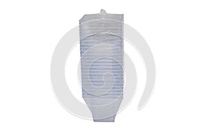 Plastic utensils in a package on a white background