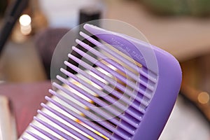 Plastic violet Hair Comb made in Italy close shot