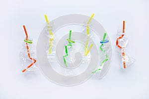 Plastic waste, Plastic bottles with straws