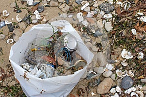 Plastic waste and human garbage thrown away on the beach