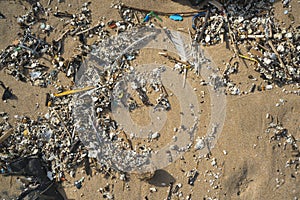 Plastic waste and micro plastic washed on the shore of the atlantic ocean