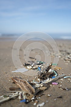 Plastic waste and micro plastic washed on the shore of the atlantic ocean