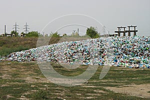 Plastic waste. Millions of pets forming a mountain. photo