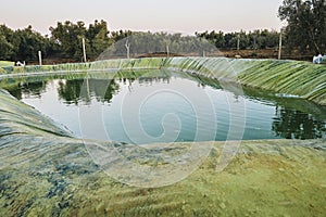 plastic water retention basin for irrigation in agriculture.