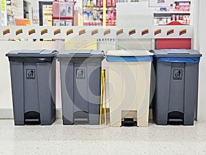 Plastic Wheeled Trash Can in front of a 7-Eleven convenience store in Ramathibodi Hospital