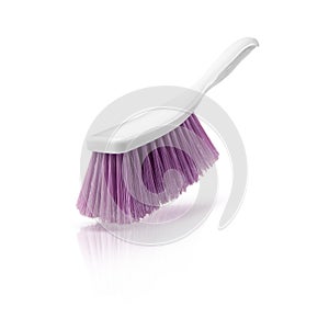 Plastic white brush with felted bristles for cleaning debris isolated on white background. Household products.