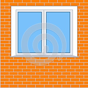 Plastic window on the background of a brick wall