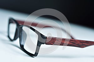 Plastic and wooden rimmed eyeglasses