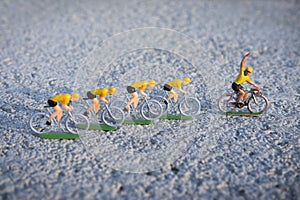 Plastic yellow road cyclists outdoor. Competition. Peloton. photo