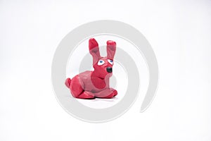 Plasticine artwork. Handmade camel. Abstract isolated photo