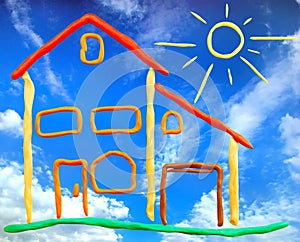 Plasticine cottage and sun