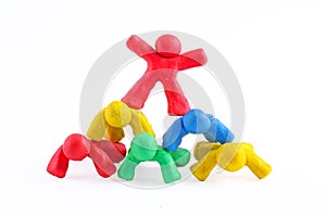 Plasticine guys making a human pyramid