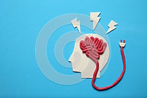 Plasticine head and brain concept. Smart mind, neurology knowledge photo