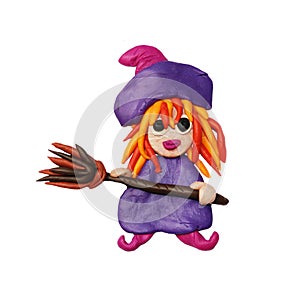 Plasticine little Halloween witch sculpture isolated