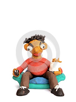 Plasticine man watching TV