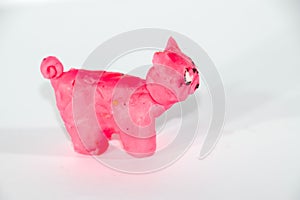 Plasticine piglet. Toys made of plasticine on white background