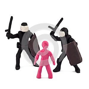 Plasticine police beating children