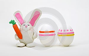 Plasticine rabbit with easter eggs
