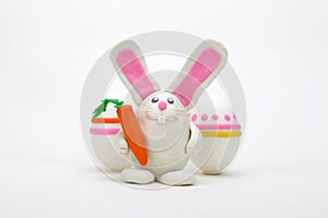 Plasticine rabbit with easter eggs