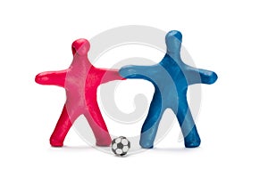 Plasticine small people soccer players with ball
