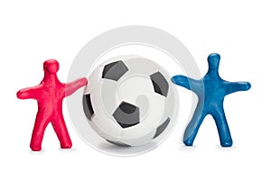 Plasticine small people soccer players with ball