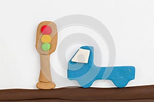 Plasticine traffic light and car.