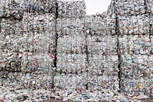 Plastics recycling centers and raw material