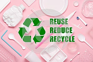 Plastics with recycling symbol and reuse reduce recycle