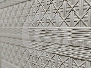 Plastik cupboard with rattan wicker motifs