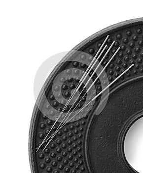 Plate with acupuncture needles