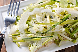 Plate of asparagus cabbage slaw salad